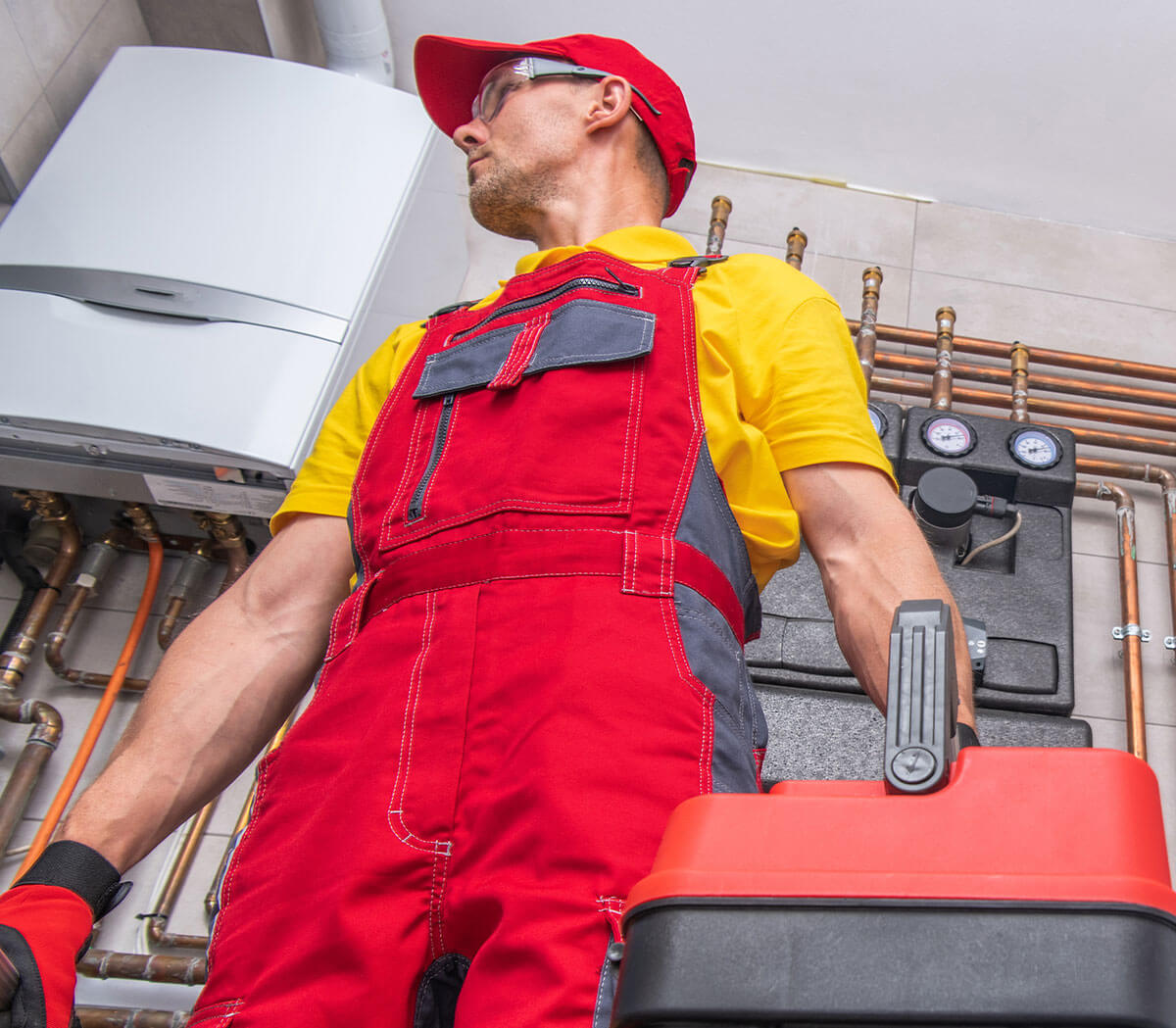 Professional boiler technician inspecting heating systems across Greater Manchester and Cheshire